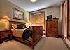 Master bedroom has queen bed and a 17" TV. Views overlooking the gondola and the mountains. Direct access to the balcony.