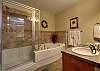 Master ensuite with bath tub and separate shower