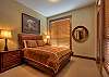 Stonegate 1 401 top floor lofted condo. Master bedroom with queen bed.