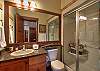 Stonegate 1 401 top floor lofted condo. Main bathroom with steam shower.
