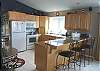 Upper level - Kitchen with breakfast bar for 3.