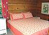 Upper level - Bedroom with a King bed, TV/VCR and ocean views.