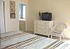 Second view - Upper level - Master bedroom with a King bed, Cable TV and a private bathroom with a large garden/soaker tub and shower.