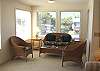 Third view - Lower Level - Living room with TV/VCR/DVD and a Hide-a-bed for additional sleeping.