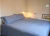 Upper level - Bedroom with a King bed and ocean views.