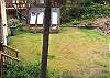 Large grassy backyard, great for the kids and pets.