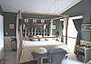 Upper Level - Master bedroom with king bed and slider out to private deck.