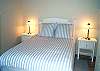 Main level Bedroom with Queen Bed and TV/VCR