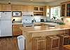 Upper level - Fully equipped kitchen with breakfast bar for 3.