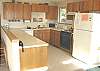 Upstairs fully equipped kitchen.