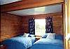 Lower level - Bedroom with two Double beds and a Double size futon.  Private bathroom with shower.
