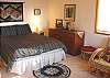Master bedroom with a Queen Bed and spectacular ocean/bay views.