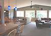 Wide view of both TV & Sitting areas in upstairs living room