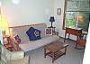 Upper level - Family room with futon for additional sleeping and TV/VCR, overlooks living room.