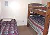 Bedroom with Twin Bunk bed and additional Twin bed