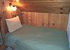 Second view of Upper level bedroom with a Double bed and Twin bed.