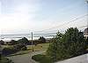 Third view - View of ocean from both the house and the large deck.