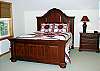 Upper level Bedroom with Queen Bed and TV.