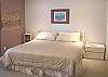 Downstairs Master Bedroom with King bed, TV/DVD/VCR and private bathroom with shower