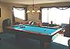 Upstair apartment living room with spectacular ocean views,  Pool Table, TV/DVD, Hide-a-bed, Pellet Stove and mini Kitchen
