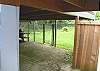 Third view - Fully fenced in large grassy backyard.