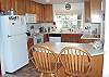 Kitchen downstairs with Breakfast Bar for 2 - fully equipped