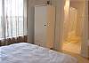 Second view - Upper level - Bedroom with Queen bed and private bathroom with tub and shower.