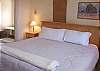 Lower level - Master bedroom with King bed and spectacular ocean view and a private bathroom with claw foot bath tub.