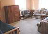 Downstairs family room with double size futon, TV/DVD/VCR (also doubles as fourth bedroom).