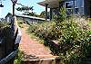 Second view - Brick path taking you up to the house.