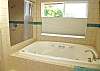 Second View - Large master bathroom with double sinks, Jacuzzi tub and large shower.