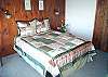 Upper level Master bedroom with a Queen bed and Twin bed, spectacular ocean views.