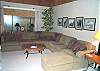 Upstairs living room with TV/VCR/DVD, slider to hot tub