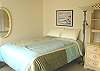 Upper level - Bedroom with a Queen bed.