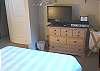 Lower level Bedroom with Queen bed and flat screen TV/DVD