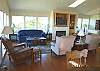 Living room with TV/DVD, gas fireplace and hide a bed for additional sleep with spectacular ocean views.