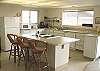 Fully equipped kitchen with breakfast bar for 3.