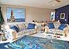 Upper level - Living room with hide-a-bed, dining for 5 and slider to large deck.