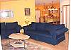 Second view of Lower level living room with TV/DVD and gas fireplace.