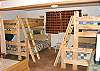 Second view - Bedroom with a Double bed and  curtain that separates it from the two Twin / Double Bunk beds with TV/VCR/DVD.