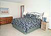 Master Bedroom on Third Floor with King bed and ocean views from Balcony