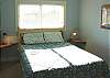 Dowstairs bedroom with Queen bed