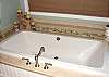 Garden tub in master bathroom.