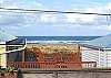 Ocean view from deck, living, kitchen and dining room.