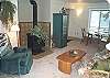 Downstairs family room with TV/DVD/VCR, Hide-a-bed, foos ball (in laundry room around the corner), game table for 2