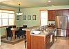 Lower level - Fully equipped kitchen and dining area.