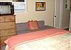Second view Master bedroom with Queen bed and short twin with 1/2 bath