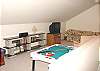 Upstairs Game Room with Game Table and Futon