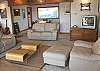 Second view - Living room with TV/DVD and spectacular ocean/bay views.