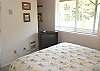 Second View - Lower (entry) level - Bedroom with a Queen bed (TV).